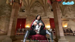 Ashlyn Peaks in einem ritterbewaffneten Cosplay mit einem Zauberstab