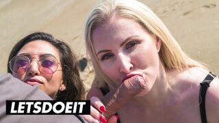 Frida Sante und Georgie Lyall saugen heiß und ficken auf einem riesigen Schwanz am Strand